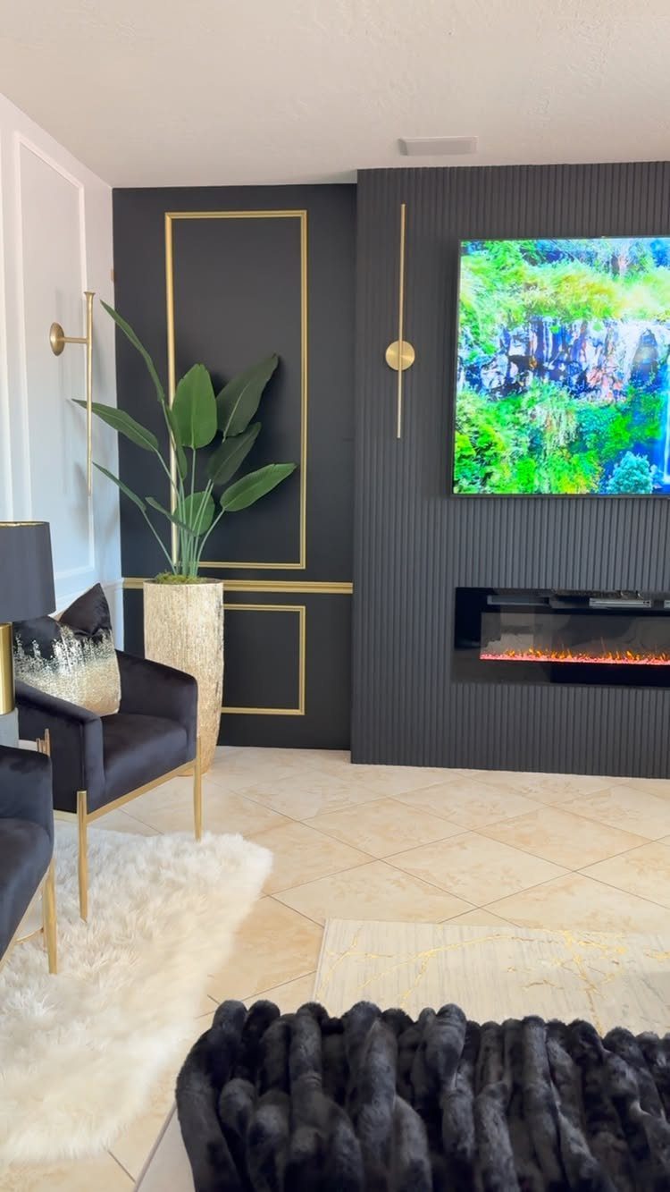 Black textured accent wall with a linear fireplace and wall-mounted television in a living room.