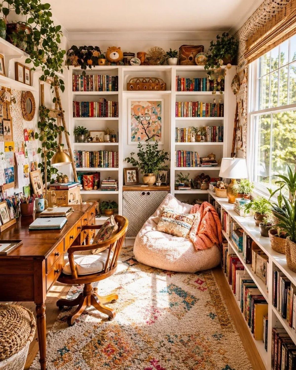 Cozy room combining a home office and reading nook with built-in bookshelves.