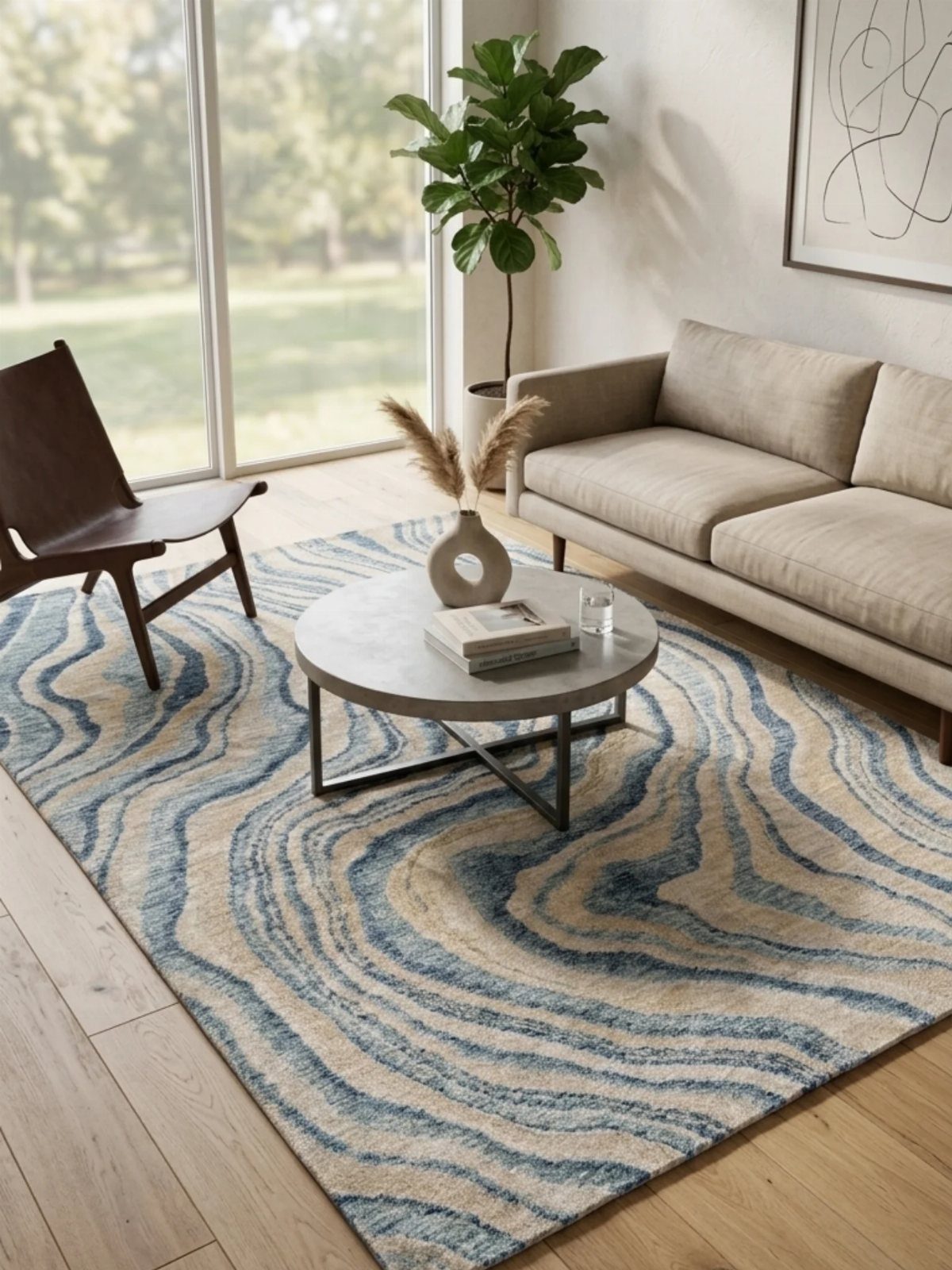 Blue and beige wavy patterned rug in a bright, modern coastal living room.