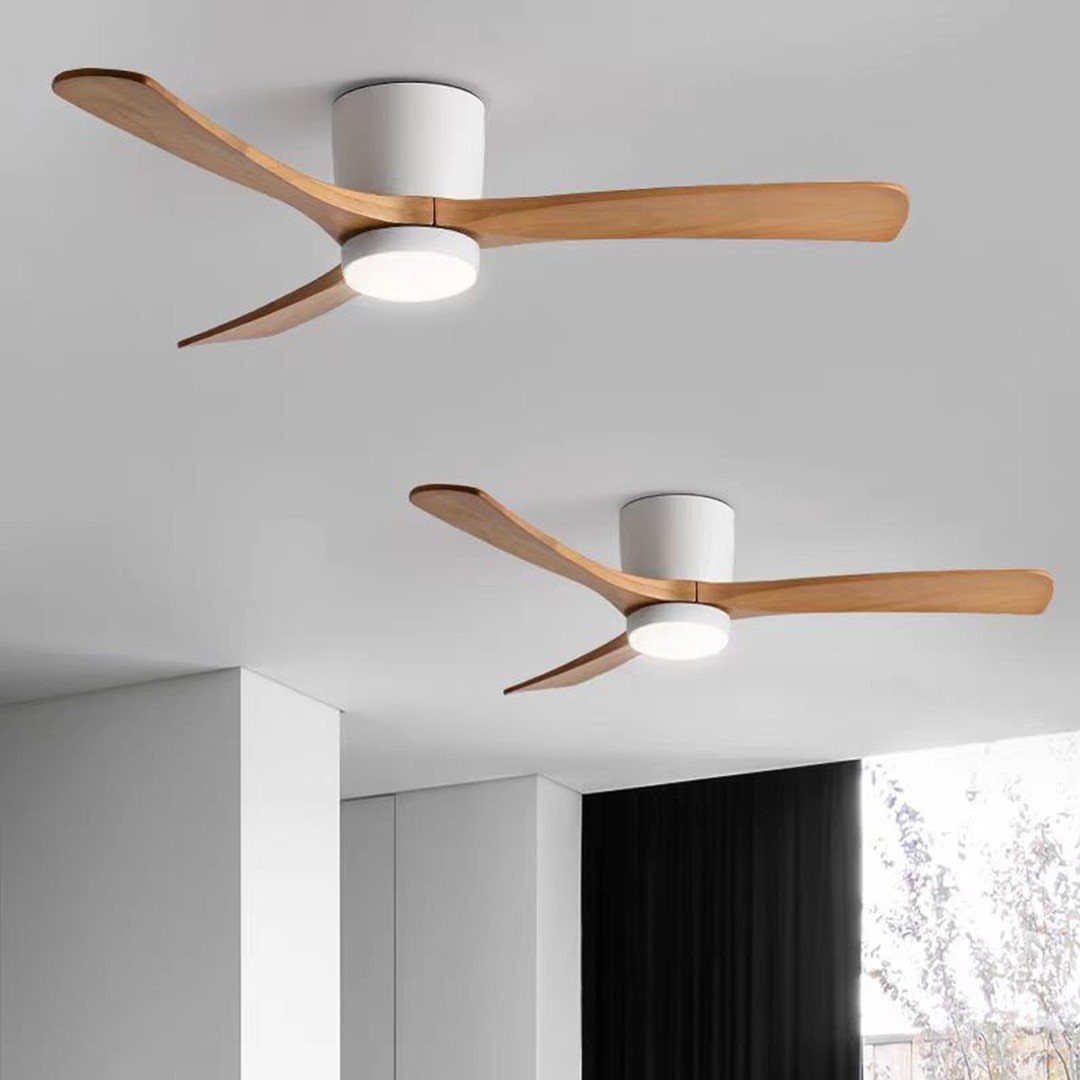 Two modern ceiling fans with wooden blades and integrated white circular lights.