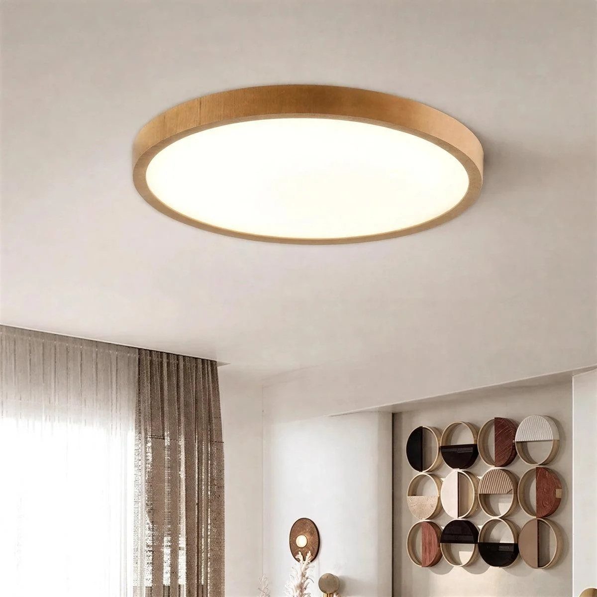 Circular flush-mount ceiling light with a wooden frame in a modern living room.
