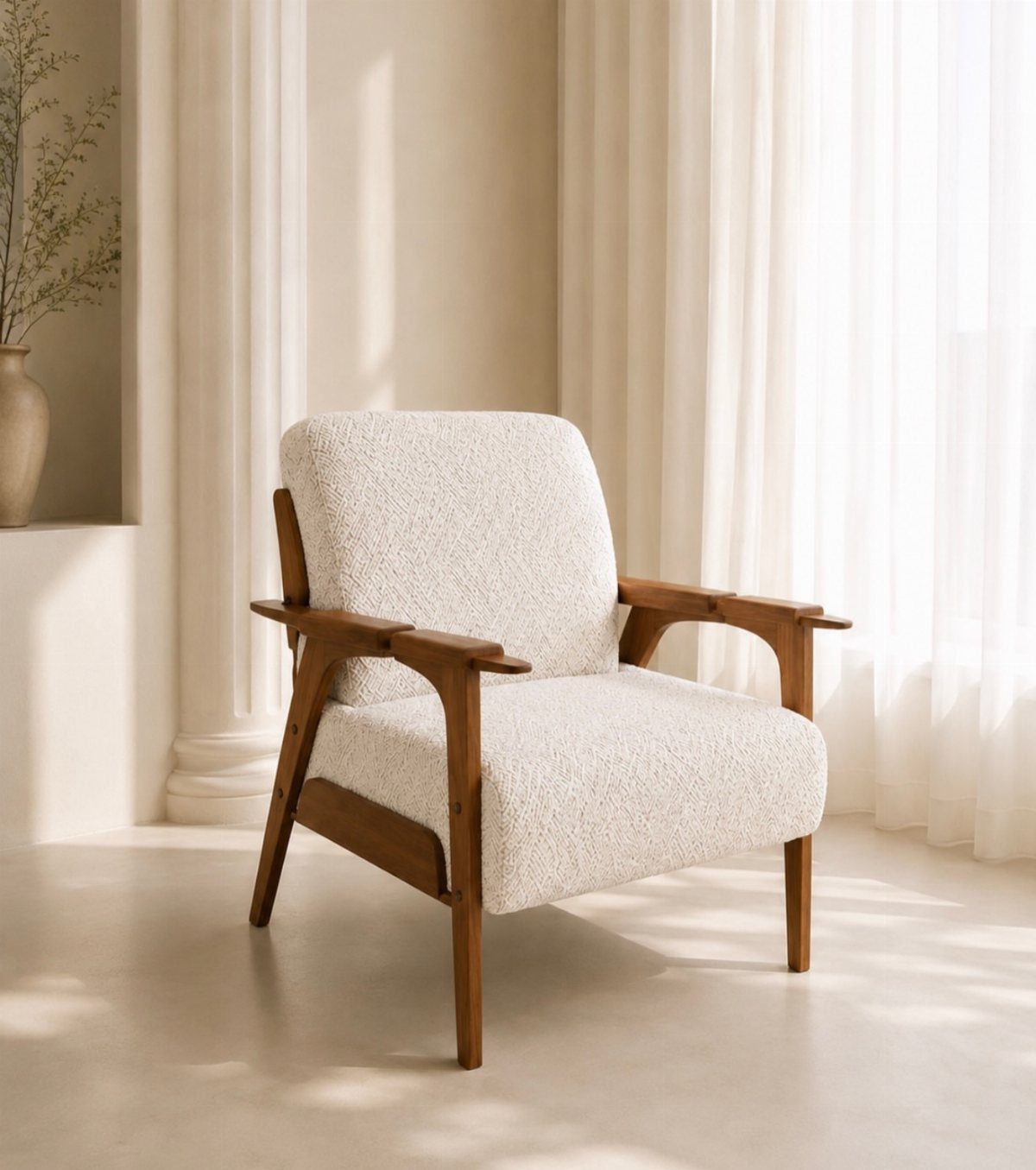 11 Living Room Ideas with Accent Chairs 8 Cream bouclé accent chair with wooden arms in a bright, neutral living room.